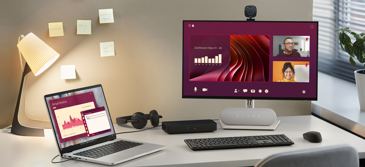 Desktop environment with laptop and monitor connected