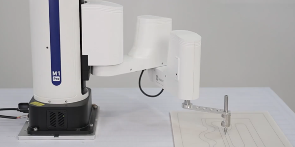 M1 Pro robot accurately drawing plans with pen.