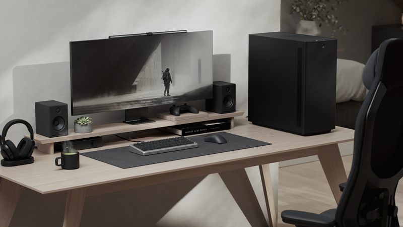 Side facing view of case on desk with minimal wooden beige coloured setup