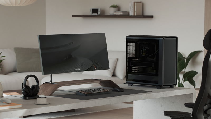 Side facing view of case on desk with minimal wooden beige coloured setup