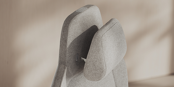 Close up of memory foam headrest at the top of the seat.