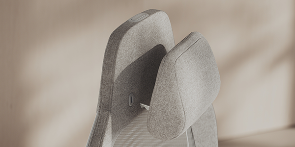Close up of memory foam headrest at the top of the seat.