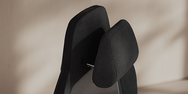 Close up of memory foam headrest at the top of the seat.