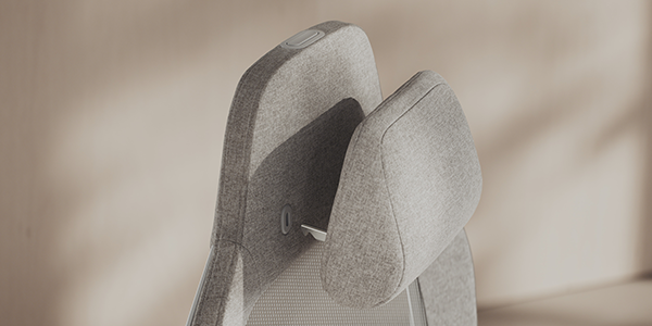 Close up of memory foam headrest at the top of the seat.