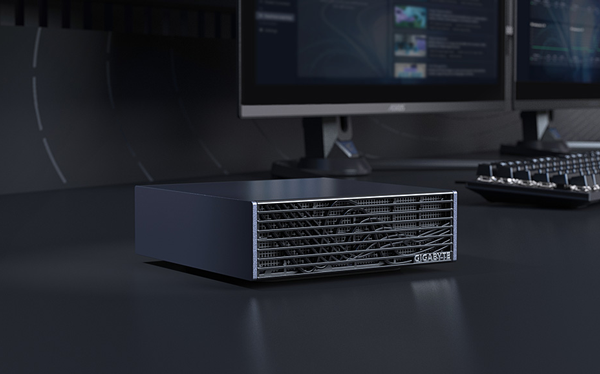 Gigabyte AI TOP ATOM sits atop a desk in a working environment