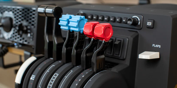 Bravo Throttle with 2 black, 2 blue and 2 red levers.