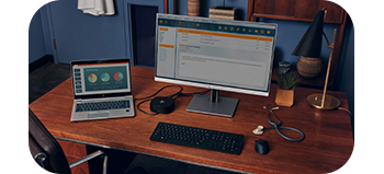 Dock on desk with laptop and monitor