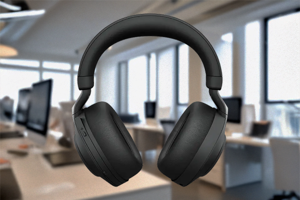 Key visual of man wearing Jabra Evolve2 85 headset with busylight on.