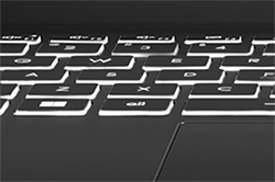 Bottom angle close up of Modern 14 laptop keyboard, highlighting backlit keys.