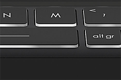 Bottom angle close up of Modern 14 laptop keyboard, highlighting 1.5mm key travel