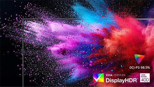 Paint splashing out of the screen to show a variety of colours