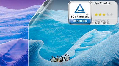 Penguins standing on iceberg with peel effect revealing blue light coating and TUV Rheinland certification