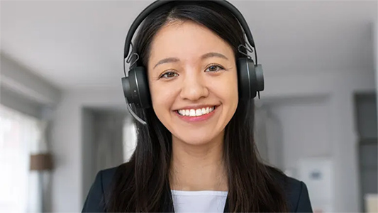 Call center agent smiling.