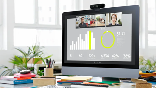 Logitech Brio Stream webcam mounted atop a pc monitor.