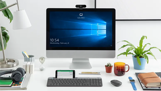 PC monitor with windows hello face sign-in on-screen.
