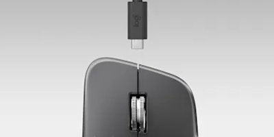USB-C cable near the charging port of the MX Master 4 mouse.