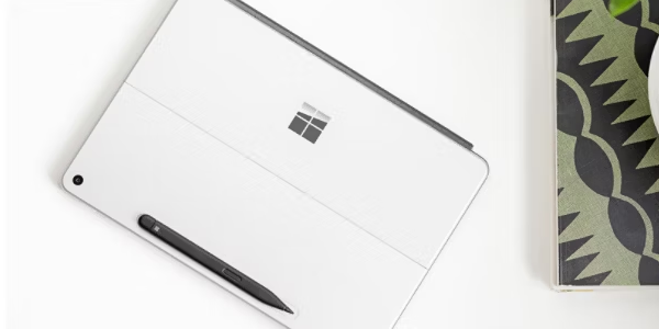 Bottom of Surface Pro, facing up on a desk to showcase built-in pen storage