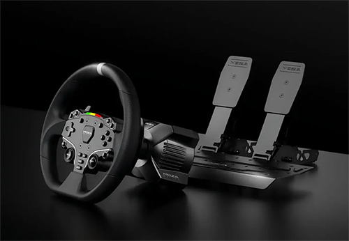 Image of the steering wheel and pedals on a black background
