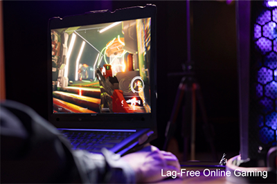 Gaming PC and peripherals in a dark room.