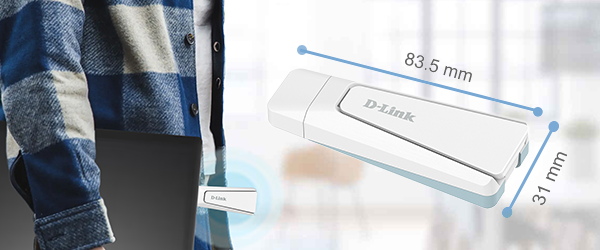 Man holding laptop by his side with AX18U usb adapter attached.