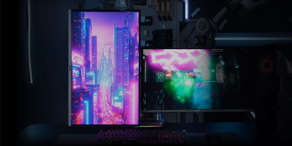 Ultra wide curved monitor mounted on monitor arm.
