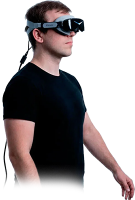 Man standing to the right wearing Pimax Dream Air VR headset.