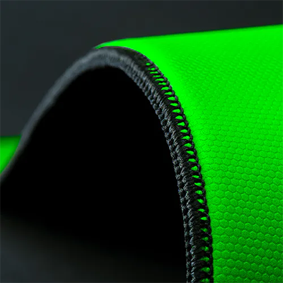 mouse mat being bent showing cross stitching