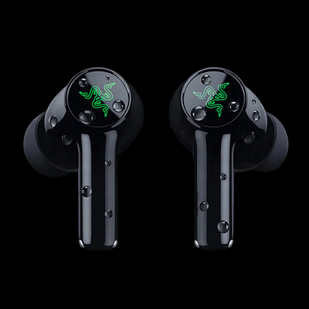 pair of earphones covered in water droplets