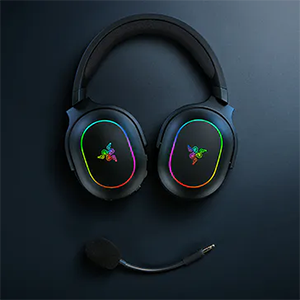 Barracuda X Chrome headset laid flat on dark matte surface with microphone detached underneath.