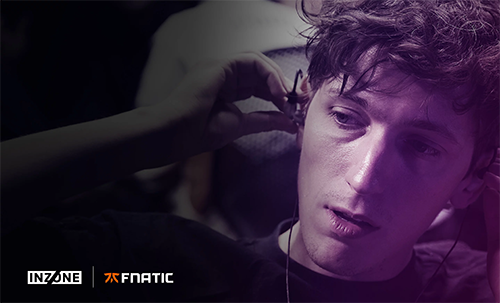 Image of a man putting in headphones