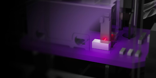 Rendering of optical switch within the mouse with red laser line located at the input point.