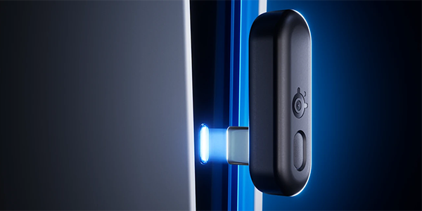 Wireless/Blutooth USB-C reciever lined up next to a blue illuiminated USB-C port.