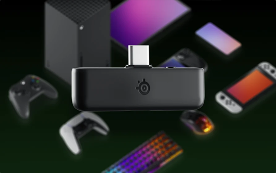 USB C dongle with Xbox, switch, ROG ally and PC peripherals organised in the background
