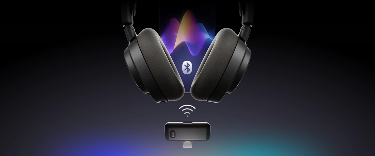 Headphones with bluetooth symbol on top of dongle with wireless symbol
