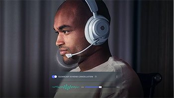 Man wearing white headphones with mic highlighted and noise cancellation slider