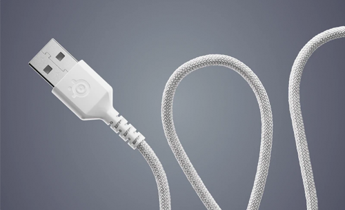 USB cable snaking in and out of grey background