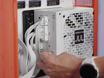 Dock module attached to the PSU inside a PC case.