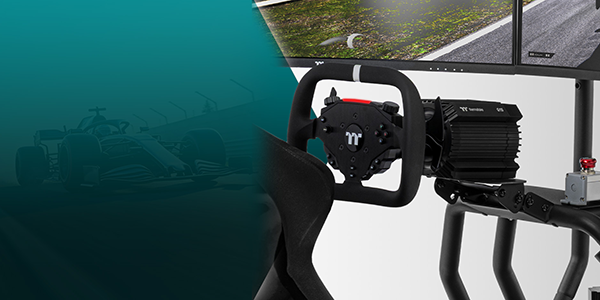Key visual of F100 steering wheel attahed to a base with monitor above.