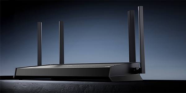 Hero angle of Archer BE220 router angled atop a slate table with ambient blue background.