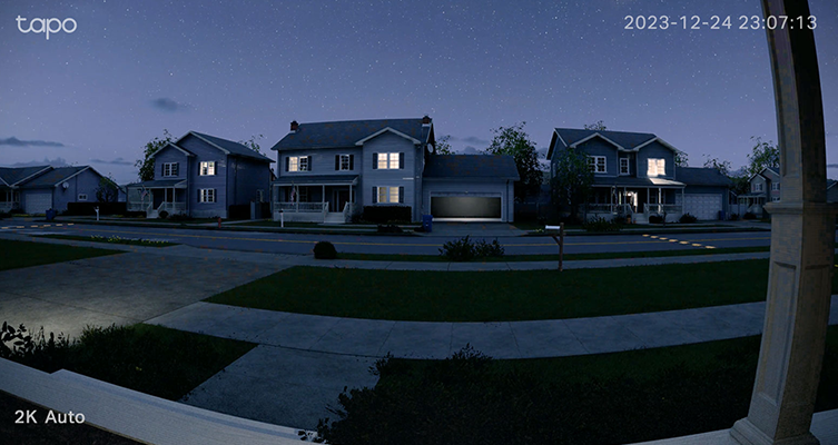 Doorbell view of neighbourhood at night.