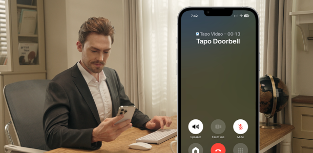 Man receiving doorbell call on his smartphone.