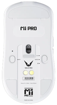 Bottom of white mouse visible with skates, sensors and mode switcher