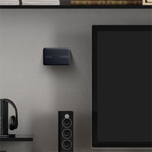 Zotac Pico mini pc hanging on a wall.