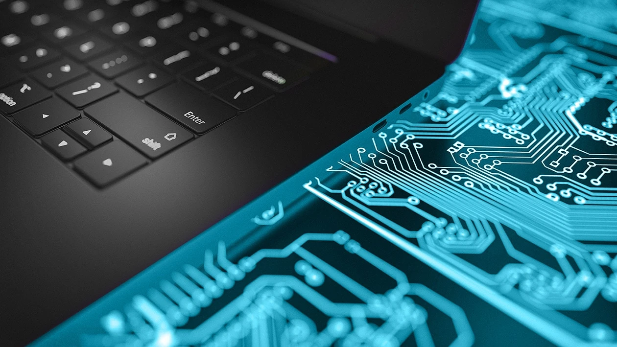 Laptop and illuminated circuit board representing AMD encrypted state protection for EPYC servers
