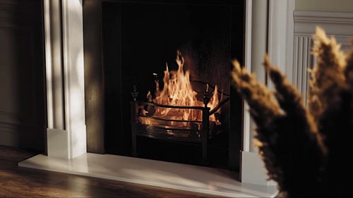 Chaos Corona sample render of lit fireplace in vintage townhouse