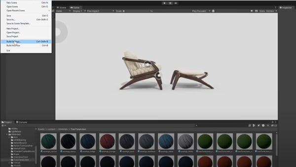 a curved wooden lounge chair and matching ottoman with light-colored cushions displayed inside unity