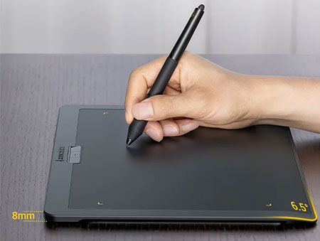 side view of someone using the xencelabs tablet showing the slope of the palm rest