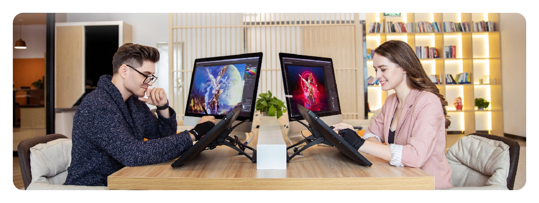 a right handed person and left handed person using the xp pen artist 22r pro on opposite sides of a table