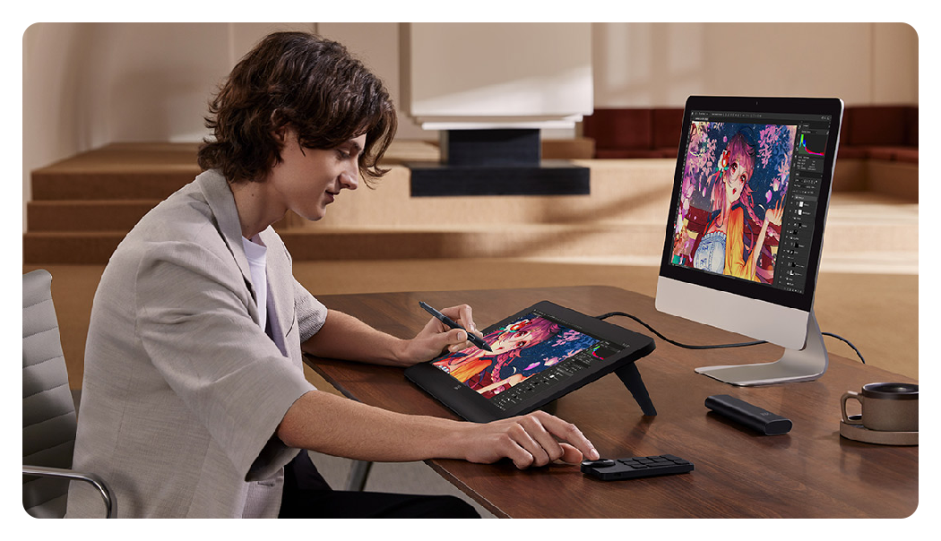 someone using the xp pen artist 16 2nd gen connected to a monitor
