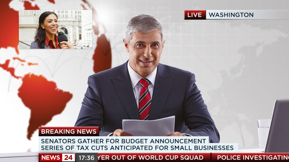a news broadcast showing a male anchor